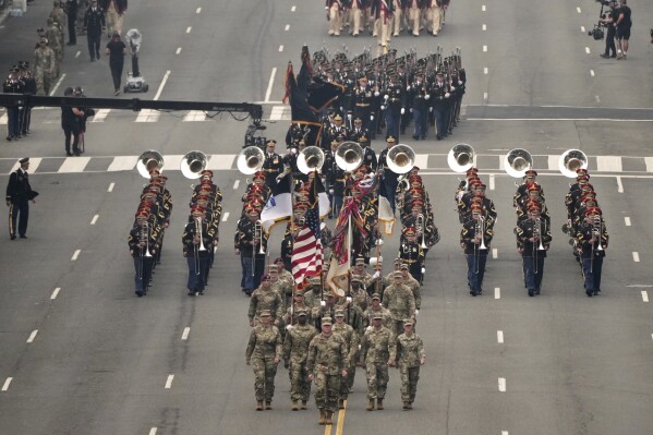 A military parade commemorating the Army's 250th anniversary and coinciding with President Donald Trump's 79th birthday, Saturday, June 14, 2025, in Washington. (AP Photo/Jacquelyn Martin)