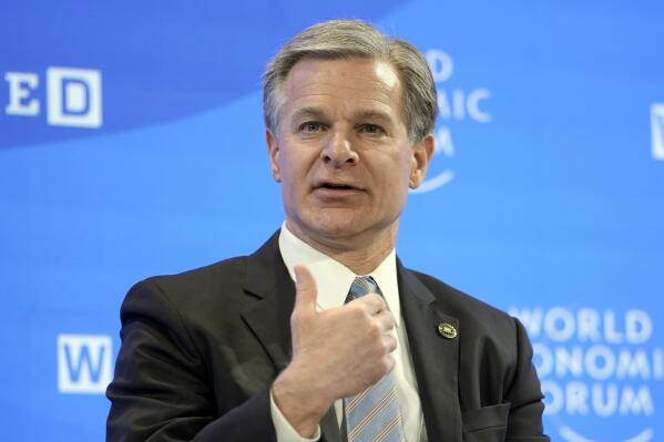 FBI Director Christopher Wray talks at the World Economic Forum in Davos, Switzerland Thursday, Jan. 19, 2023. The annual meeting of the World Economic Forum is taking place in Davos from Jan. 16 until Jan. 20, 2023. (AP Photo/Markus Schreiber)