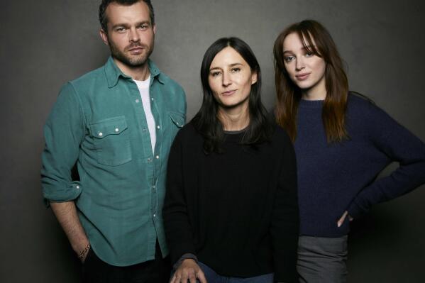 Alden Ehrenreich, from left, director Chloe Domont, and Phoebe Dynevor pose for a portrait to promote the film "Fair Play" at the Latinx House during the Sundance Film Festival on Saturday, Jan. 21, 2023, in Park City, Utah. (Photo by Taylor Jewell/Invision/AP)
