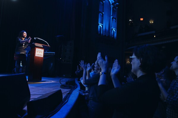 FILE - People applaud as Rev Jacqui Lewis speaks on stage during the "People's State of the Union" event at The Town Hall in New York, Monday, Jan. 29, 2018. Lewis is proud to be carrying on her family's tradition of civil rights activism. The Civil Rights Movement of the 1960s “was not just Black male clergy in the south,” she said. “It was women who decided to march and not get on the buses (during the Montgomery bus boycott of 1955-56). It was white people who decided to pick up Black people in their cars and drive them to work. All the everyday, ordinary people who participated in this southern freedom movement.” (AP Photo/Andres Kudacki, File)