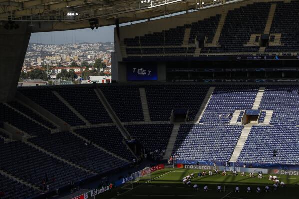 Chelsea's players stretch during a training session ahead of the Champions League final match at the Dragao stadium in Porto, Portugal, Friday, May 28, 2021. Manchester City and Chelsea will play the Champions League final on Saturday. (Susana Vera/Pool via AP)