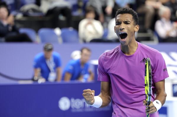 Canada's Felix Auger-Aliassime reacts after winning the men's singles final against United States Sebastian Korda at the European Open tennis tournament in Antwerp, Belgium, Sunday, Oct. 23, 2022. (AP Photo/Olivier Matthys)