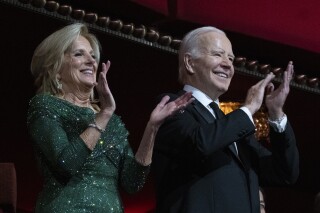 President Joe Biden and first lady Jill Biden applaud during the 46th Kennedy Center Honors at the John F. Kennedy Center for the Performing Arts in Washington, Sunday, Dec. 3, 2023. (AP Photo/Manuel Balce Ceneta)