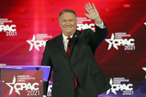 FILE - 70th United States Secretary of State Mike Pompeo waves as he is introduced at the Conservative Political Action Conference (CPAC) on Feb. 27, 2021, in Orlando, Fla. From the point of view of C-SPAN, the 2024 presidential campaign begins this Friday, March 26, 2021. The network is sending it cameras to suburban Des Moines, Iowa, to tape Pompeo speaking to a breakfast meeting of the Westside Conservative Club, to be aired later in the day on Friday. (AP Photo/John Raoux, File)