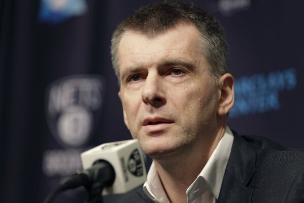 
              FILE - In this Monday, Jan. 11, 2016 file photo, Brooklyn Nets owner Mikhail Prokhorov speaks during an NBA basketball news conference in New York. The Trump administration has released a list of 114 Russian politicians and 96 "oligarchs" it says are linked to Russian President Vladimir Putin, but it’s decided not to issue any extra sanctions for now. The billionaire owner of the NBA’s Brooklyn Nets, Prokhorov has at times had an uneasy relationship with the Kremlin.  (AP Photo/Seth Wenig, File)
            
