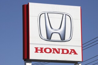FILE - The logo of Honda Motor Co., is seen in Yokohama, near Tokyo on Dec. 15, 2021. Honda Motor’s American arm is recalling more than 2.5 million vehicles in the U.S. due to a fuel pump defect that can increase risks of engine failure or stalling while driving. (AP Photo/Koji Sasahara, File)