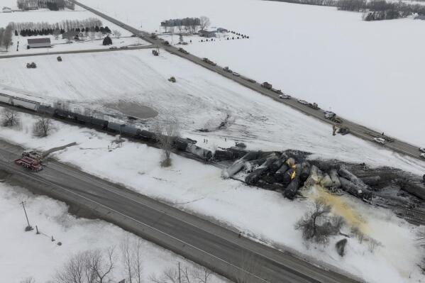 A BNSF train carrying ethanol and corn syrup derailed and caught fire in Raymond, Minn., Thursday, March 30, 2023. BNSF officials said 22 cars derailed, including about 10 carrying ethanol, and the track remains blocked, but that no injuries were reported due to the accident. The cause of the derailment hasn't been determined. (Mark Vancleave /Star Tribune via AP)