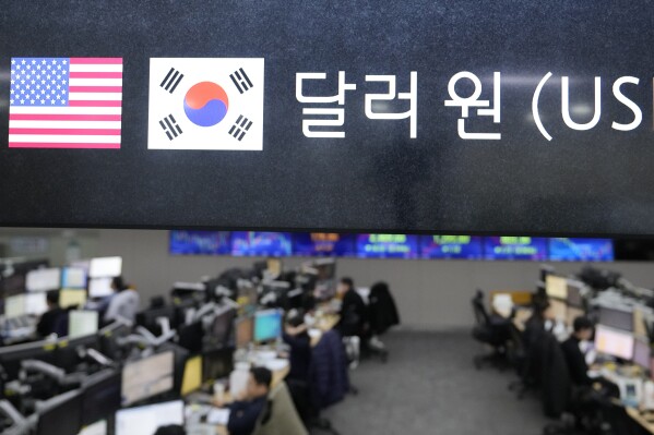 The screen showing the foreign exchange rate between U.S. dollar and South Korean won is seen at a foreign exchange dealing room in Seoul, South Korea, Friday, Nov. 17, 2023. Asian stocks were mostly lower Friday after Wall Street drifted to a mixed finish as momentum slowed following a strong rally in the first half of November.(AP Photo/Lee Jin-man)