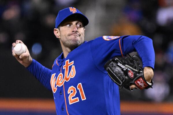 New York Mets starting pitcher Max Scherzer (21) delivers the ball to the San Francisco Giants during the second inning of the second game of a baseball double-header Tuesday, April 19, 2022, in New York. (AP Photo/Bill Kostroun)