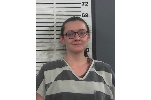 FILE - This booking photo provided by the Platte County Sheriff's Office shows Lorna Roxanne Green, March 23, 2023, in Wheatland, Wyo. Green, a college student who authorities say admitted setting fire to a building slated to become Wyoming’s only full-service abortion clinic, has reached a plea agreement with prosecutors, federal court documents showed Monday, July 10. (Platte County Sheriff's Office via AP, File)