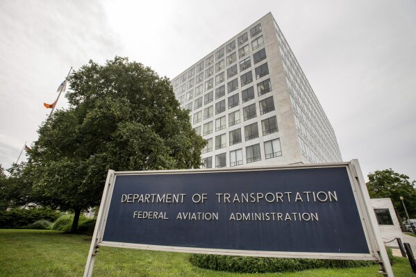 
              FILE - This June 19, 2015, file photo, shows the Department of Transportation Federal Aviation Administration building in Washington. America's standing as the model for aviation-safety regulation will be on trial as congressional hearings begin Wednesday, March 27, 2019, into the Federal Aviation Administration's oversight of Boeing before and after two deadly crashes of its best-selling airliner. (AP Photo/Andrew Harnik, File)
            