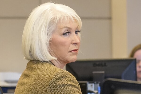 FILE - Tina Peters, former Mesa County, Colo., clerk, listens during her trial, Friday, March 3, 2023, in Grand Junction, Colo. (Scott Crabtree/The Grand Junction Daily Sentinel via AP, Pool, File)