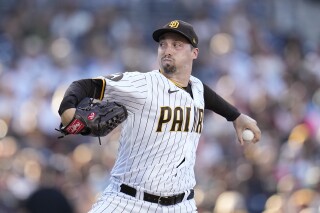 FILE - San Diego Padres starting pitcher Blake Snell works against a San Francisco Giants batter during the second inning of a baseball gam, Sept. 2, 2023, in San Diego. Two-time Cy Young Award winner Snell and the San Francisco Giants have agreed to a $62 million, two-year contract, a person familiar with the negotiations told The Associated Press on Monday, March 18, 2024. (AP Photo/Gregory Bull, File)