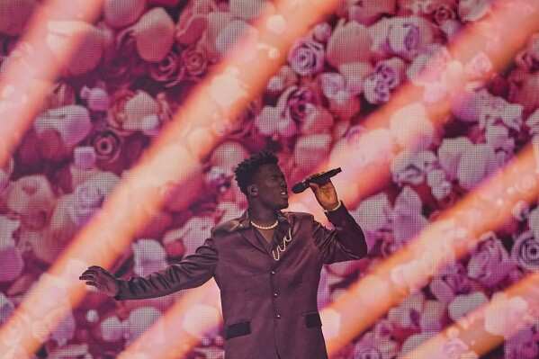 Claude from the Netherlands performs the song "C'est La Vie" during the first semi-final of the 69th Eurovision Song Contest, in Basel, Switzerland, Tuesday, May 13, 2025. (AP Photo/Martin Meissner)