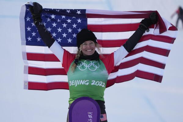 United States' Lindsey Jacobellis celebrates after winning a gold medal in the women's cross finals at the 2022 Winter Olympics, Wednesday, Feb. 9, 2022, in Zhangjiakou, China. (AP Photo/Lee Jin-man)