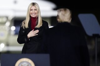 Ivanka Trump comes onto stage as President Donald Trump speaks at a campaign rally in support of Senate candidates Sen. Kelly Loeffler, R-Ga., and David Perdue in Dalton, Ga., Monday, Jan. 4, 2021. (AP Photo/Brynn Anderson)