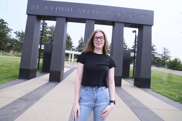 University student Christina Westman poses at St. Cloud State University, Tuesday, July 30, 2024, in St. Cloud, Minn. (AP Photo/Adam Bettcher)