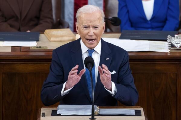 FILE - President Joe Biden delivers his first State of the Union address to a joint session of Congress at the Capitol, March 1, 2022, in Washington. A year ago, President Joe Biden used his first State of the Union address to push top Democratic priorities that were sure to face a battle in the narrowly divided Congress but he also laid out a four-pronged "unity agenda" that would be an easier sell.(Jim Lo Scalzo/Pool via AP, File)