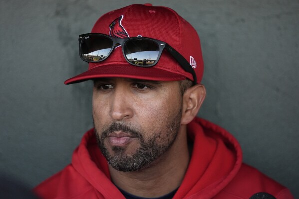 St. Louis Cardinals manager Oliver Marmol speaks to the media before the start of a spring training baseball game against the Boston Red Sox Tuesday, Feb. 27, 2024, in Jupiter, Fla. (AP Photo/Jeff Roberson)