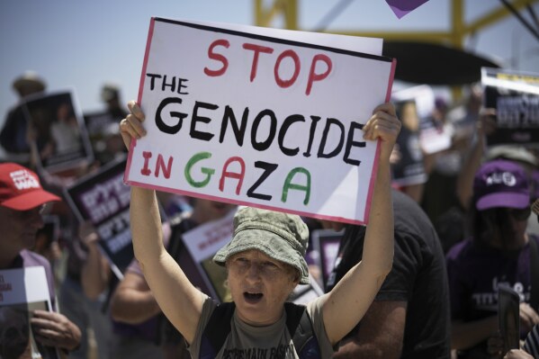 People take part in a protest demanding the end of the war in the Gaza Strip in an area near the Israeli-Gaza border in Sderot, southern Israel, Friday, May 23, 2025. (AP Photo/Leo Correa)