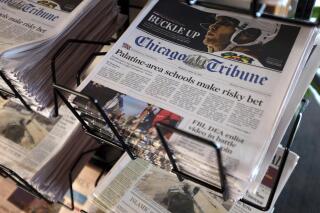 FILE - In this Monday, April 25, 2016, file photo, Chicago Tribune and other newspapers are displayed at Chicago's O'Hare International Airport.  Shareholders of Tribune Publishing, one of the country’s largest newspaper chains, will vote Friday, May 21, 2021, on whether to be acquired by a hedge fund that already owns one-third of the company and favors aggressive cost-cutting to boost profits. (AP Photo/Kiichiro Sato, File)