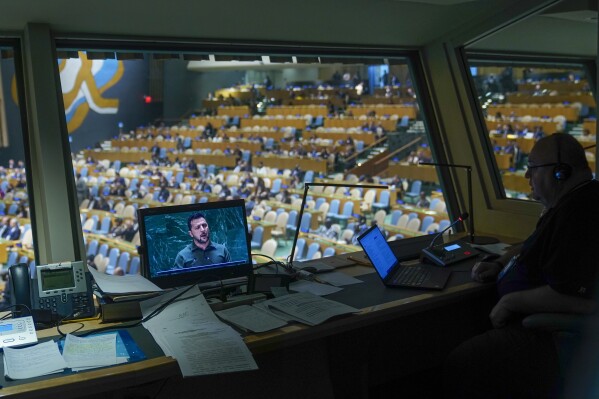 Ukranian President Volodymyr Zelenskyy is seen on a translator's video screen as he addresses the 78th session of the United Nations General Assembly, Tuesday, Sept. 19, 2023 at United Nations headquarters. (AP Photo/Mary Altaffer)