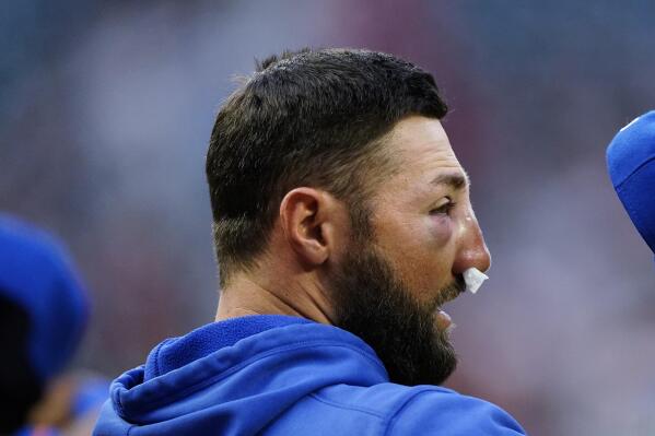 New York Mets' Kevin Pillar smiles in the dugout during the team's