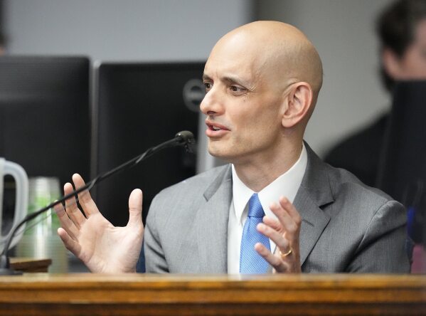 FILE - Gerard Magliocca, a professor at Indiana University's Robert H. McKinney School of Law, testifies during a hearing for a lawsuit to keep former President Donald Trump off the Colorado ballot, Nov. 1, 2023, in Denver. During the coronavirus pandemic, Magliocca began to research the history of two rarely noticed sentences tucked in the middle of the 14th Amendment. (AP Photo/Jack Dempsey, Pool, File)