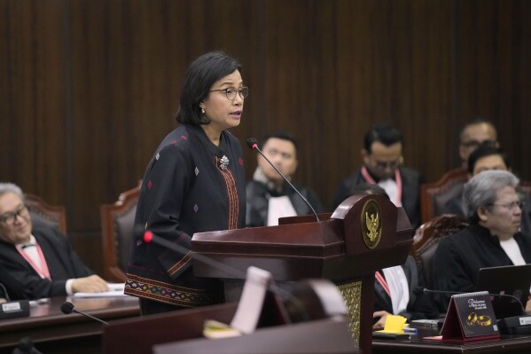 Indonesian Finance Minister Sri Mulyani Indrawati delivers her statement during a hearing on the presidential election result dispute at the Constitutional Court in Jakarta, Indonesia, Friday, April 5, 2024. (AP Photo/Dita Alangkara)