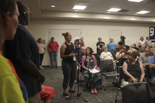 City of Charleston Quick Response Team Coordinator Danni Dineen, a recovering heroin user, speaks in support of a proposal from the Women's Health Center of West Virginia to add a syringe service program to its offerings during a public hearing at the Goodwill Prosperity Center in Charleston, W.Va. on Thursday, July 27, 2023. (AP Photo/Leah Willingham)