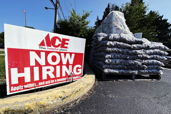 A hiring sign is displayed outside a hardware store in Buffalo Grove, Ill., Sunday, July 9, 2023. On Thursday, the Labor Department reports on the number of people who applied for unemployment benefits last week(AP Photo/Nam Y. Huh)
