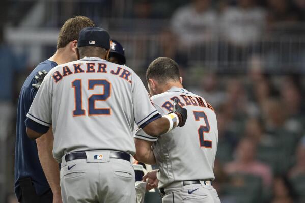 Houston Astros' Alex Bregman checks his swing during batting