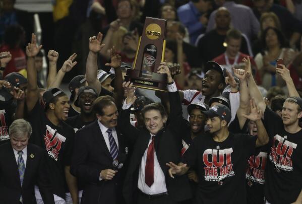 St. John's coach Rick Pitino throws out first pitch to Donovan