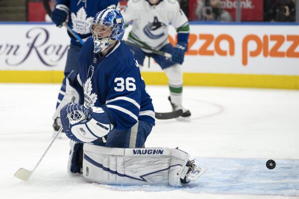 Toronto Maple Leafs goaltender Jack Campbell (36) reacts after giving up a goal to the Vancouver Canucks during the first period of an NHL hockey game Saturday, March 5, 2022, in Toronto. (Frank Gunn/The Canadian Press via AP)