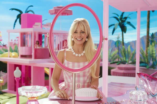 This image released by Warner Bros. Pictures shows Margot Robbie in a scene from "Barbie." (Warner Bros. Pictures via AP)