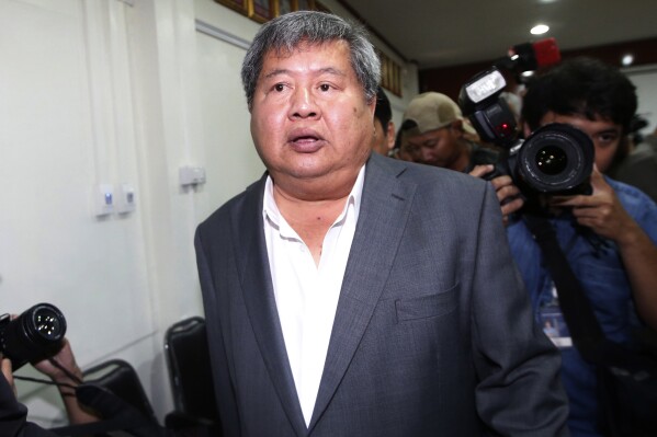 FILE - Thai business tycoon, chairman of Italian-Thai Development Plc, one of Thailand’s top construction firms, Premchai Karnasuta arrives at the wildlife police headquarters in Bangkok, Thailand on March 14, 2018. Karnasuta convicted poaching protected animals in a wildlife reserve was freed Tuesday Oct. 17, 2023 on parole two months ahead of the end of his prison term. (AP Photo/Sakchai Lalit, File)