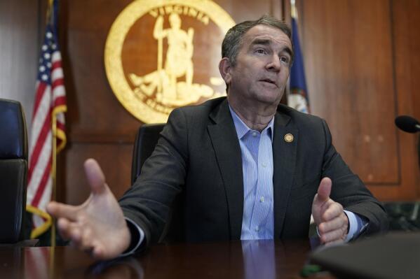 Virginia Gov. Ralph Northam speaks during an interview in his conference room at the Capitol Monday, Jan. 10, 2022, in Richmond, Va. Northam, who's term ends Saturday, Jan. 15,  will go back to private practice. (AP Photo/Steve Helber)
