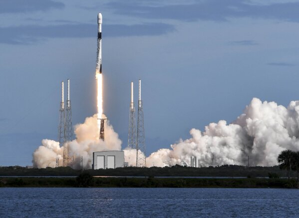 A SpaceX Falcon 9 rocket lifts off from Cape Canaveral Air Force Station, Monday, Nov. 11, 2019, in Cape Canaveral, Fla. SpaceX launched 60 mini satellites Monday, the second batch of an orbiting network meant to provide global internet coverage. (Craig Bailey/Florida Today via AP)