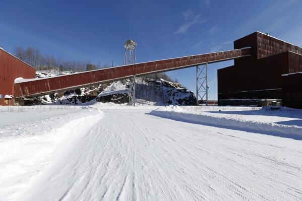 FILE - This Feb. 10, 2016 file photo shows a former iron ore processing plant near Hoyt Lakes, Minn., that would become part of a proposed PolyMet copper-nickel mine.   The proposed PolyMet copper-nickel mine in northern Minnesota encountered a setback Monday, July 19, 2021, when the state Court of Appeals ordered regulators to revisit a critical air emissions permit given to the project. (AP Photo/Jim Mone, File)