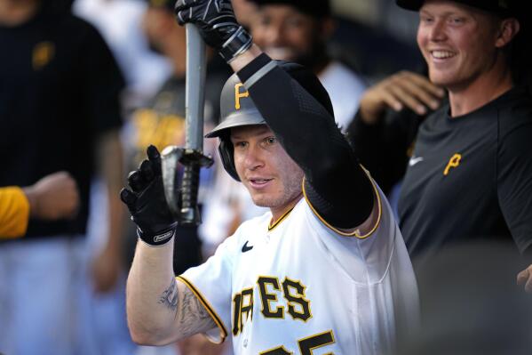 Pittsburgh Pirates' Connor Joe walks through the dugout before