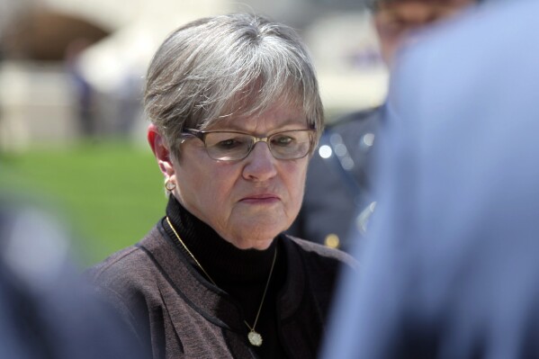 Kansas Gov. Laura Kelly participates in a ceremony honoring fallen law enforcement officers Friday, May 3, 2024 outside the Statehouse in Topeka, Kan. The Democratic governor has vetoed a bill approved by the Republican-controlled Kansas Legislature for ensuring that child support payments cover fetuses. (AP Photo/John Hanna)