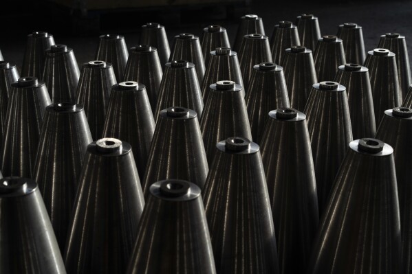 Mortar shells are seen at a factory in Ukraine, on Wednesday, January 31, 2024. (AP Photo/Evgeniy Maloletka)