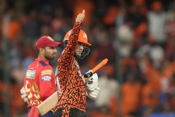 Sunrisers Hyderabad's Abhishek Sharma celebrates his fifty runs during the Indian Premier League cricket match between Sunrisers Hyderabad and Punjab Kings in Hyderabad, India, Sunday, May19, 2024. (AP Photo/Mahesh Kumar A.)