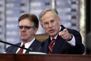 
              FILE - In a Tuesday, Feb. 5, 2019 file photo, Texas Gov. Greg Abbott, right, gives his State of the State Address as Texas Lt. Gov. Dan Patrick, left, listens in the House Chamber, in Austin, Texas. Texas Gov. Greg Abbott doesn’t flash the White House ambitions of his predecessors, but the Republican has built his own distinction by taking in more donor cash than any governor in history. (AP Photo/Eric Gay, File)
            