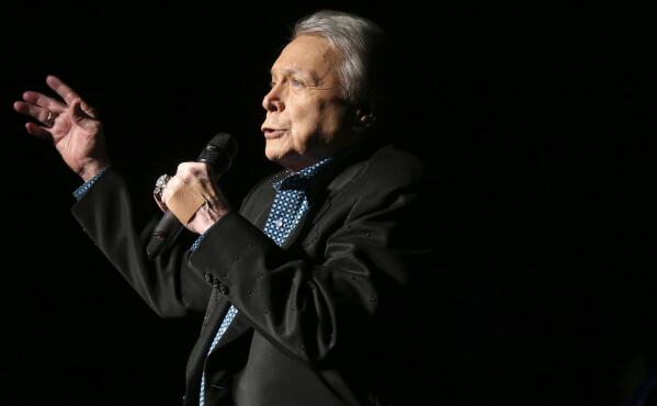 FILE - Country music legend Mickey Gilley, 80, performs at Shenandoah University in Winchester, Va. to benefit the Shenandoah Valley Battlefields National Historic District, Saturday, Jan. 14, 2017. Gilley, whose namesake Texas honky-tonk inspired the 1980 film “Urban Cowboy,” and a nationwide wave of Western-themed nightspots, died Saturday, May 7, 2022, at age 86. ( Jeff Taylor/The Winchester Star via AP, File)