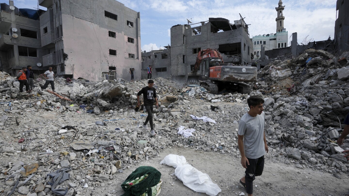 Thousands of bodies lie buried in rubble in Gaza. Families dig to retrieve them, often by hand