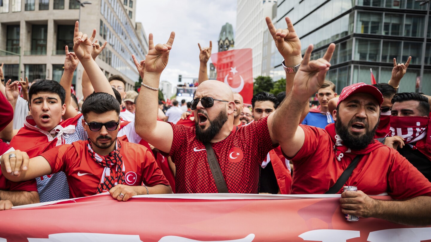 Turkey supporters make controversial hand gesture on way to stadium and in it for Euro 2024 match