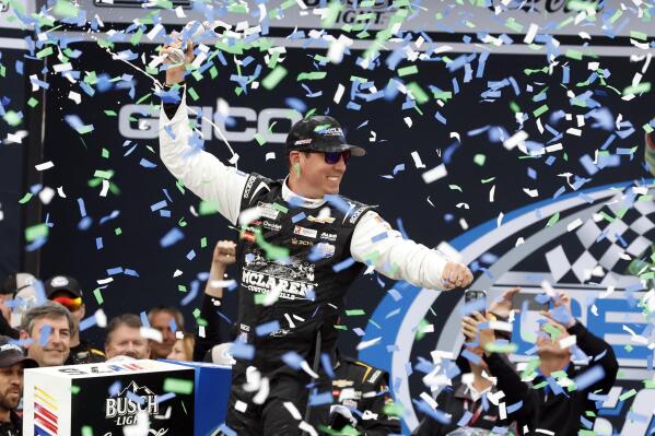 Kyle Busch celebrates in Victory Lane after winning a NASCAR Cup Series auto race at Talladega Superspeedway, Sunday, April 23, 2023, in Talladega, Ala. (AP Photo/Butch Dill)