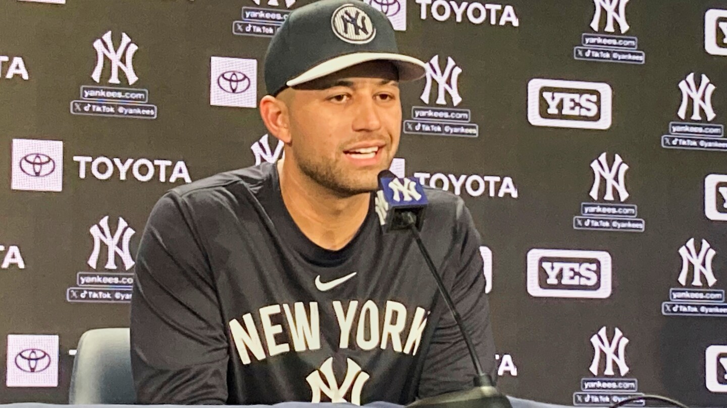 Once a ride-share driver, J.C. Escarra takes an Uber to Yankee Stadium for his first game in MLB