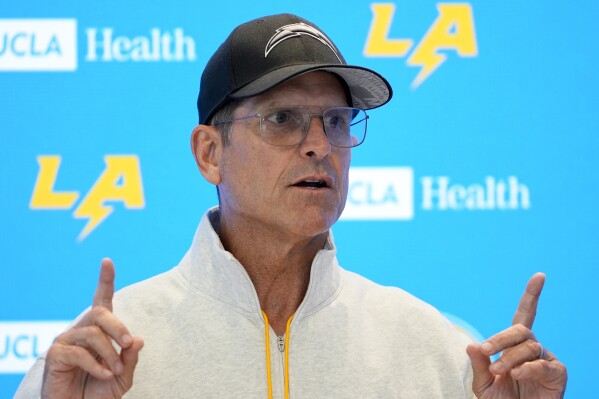 Los Angeles Chargers head coach Jim Harbaugh speaks at a news conference after NFL football training camp Monday, July 29, 2024, in El Segundo, Calif. (AP Photo/Ryan Sun)